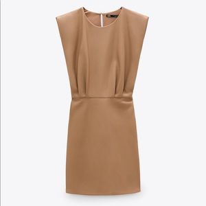 Zara - faux leather mini dress in beige